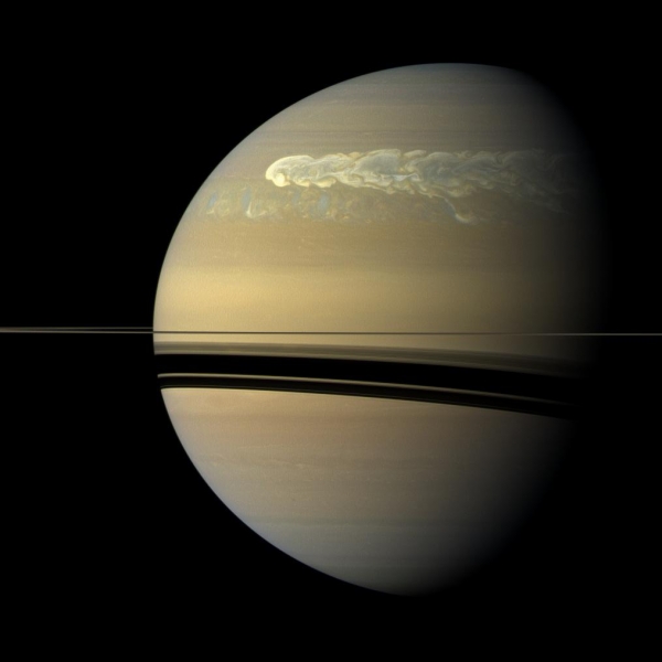 An enormous storm on Saturn completely encircles the giant planet.