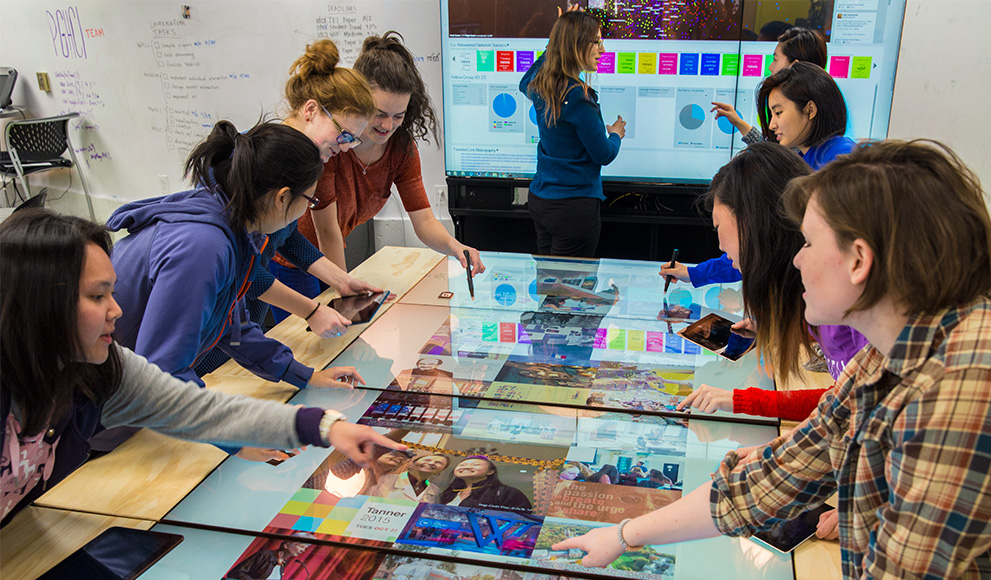 Students use MultiTaction display in Wellesley's Human Computer Interaction Lab