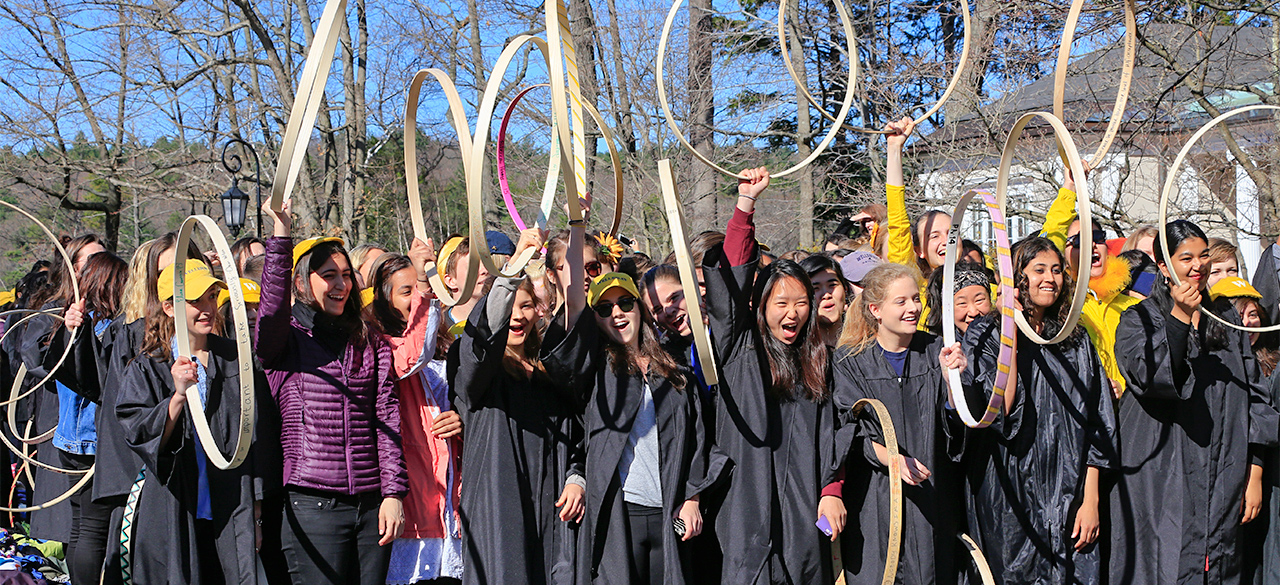 Wellesley seniors compete in the 120th Hooprolling competition.