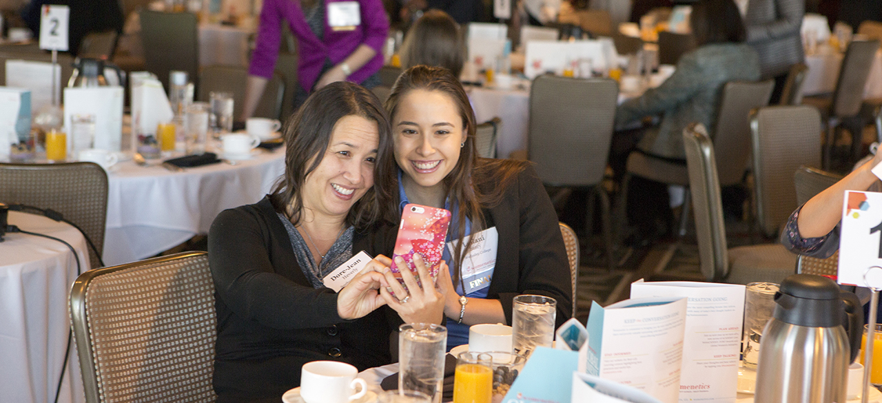 Leilani Stacy ‘18, a finalist in a national essay contest, snaps a picture with her mother at a gathering hosted by the contest’s sponsoring organization, Womenetics. 