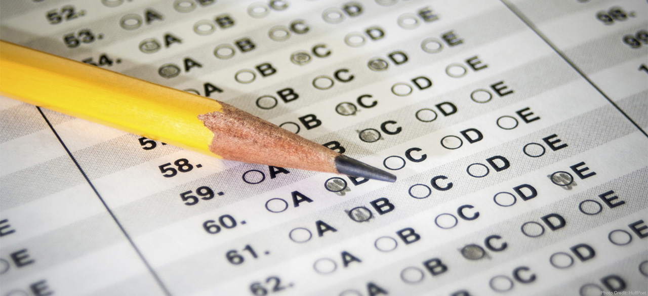 Pencil lays on a scantron style test, some bubbles are filled in. 