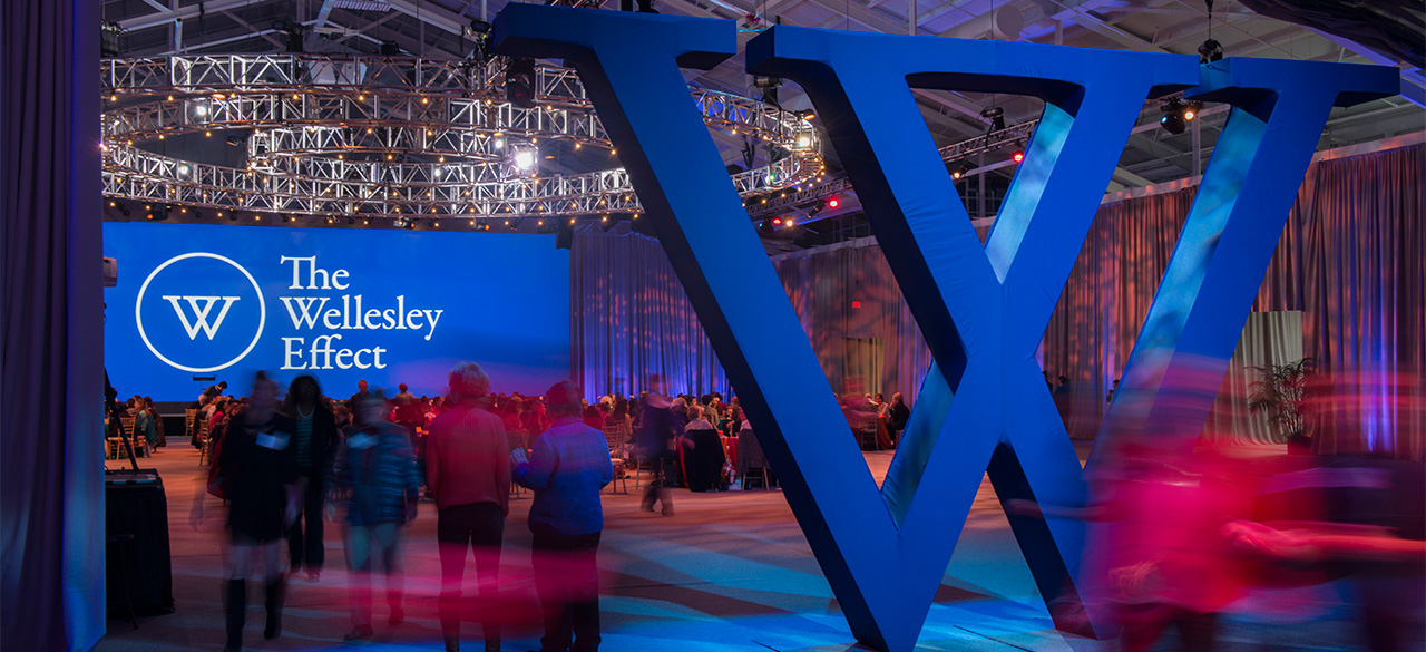 An interior photo of the Wellesley fieldhouse decorated for the launch of the Campaign for Wellesley