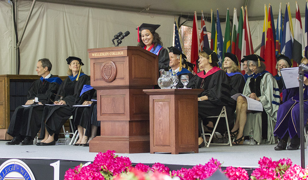 Delia Arias De Leon, co-president of the Class of 2016, introducing her fellow class co-president, and this year's student speaker, Grace Park. 