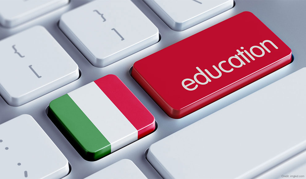 A keyboard with one key that looks like an Italian flag and another that says education