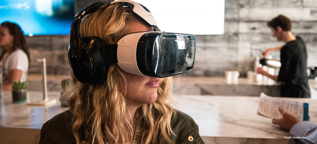 Young woman uses virtual reality googles