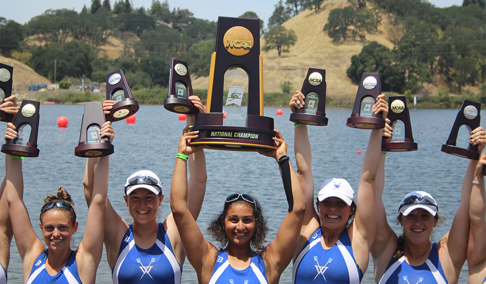 Wellesley Crew athletes lift their NCAA National Championship trophy