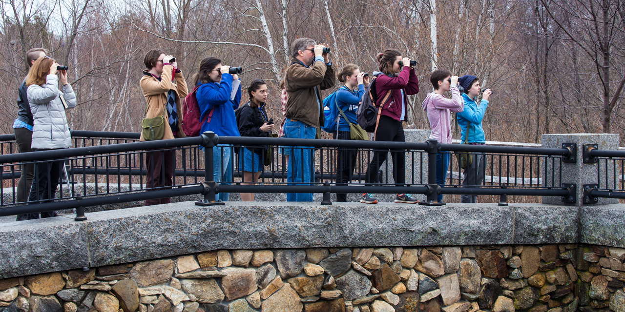 Nicholas Rodenhouse leads a bird walk around campus