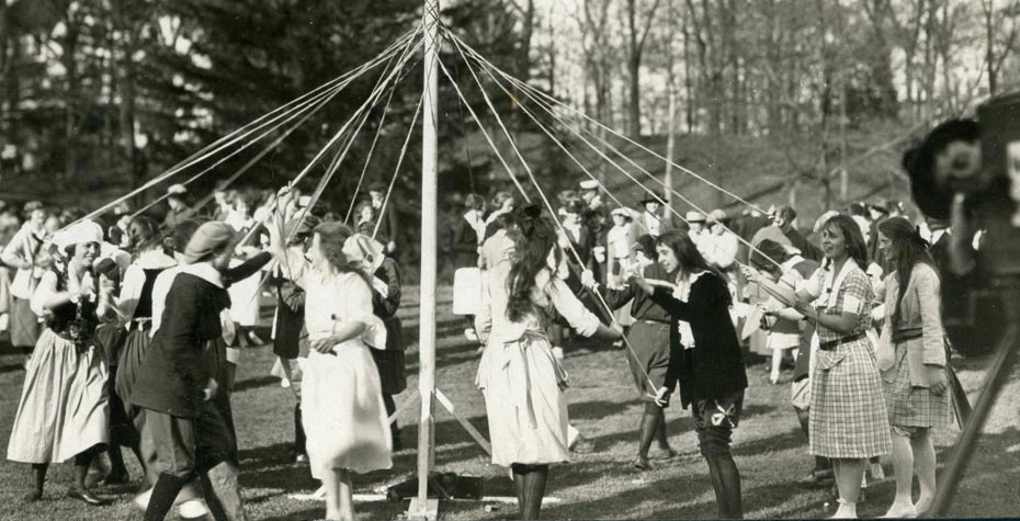 closeup of students dancing around maypole, 1919