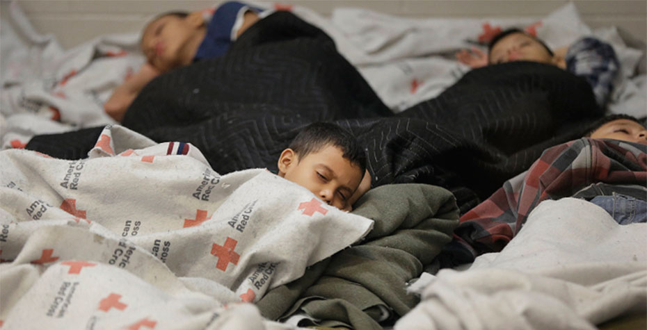 children sleeping in refugee center