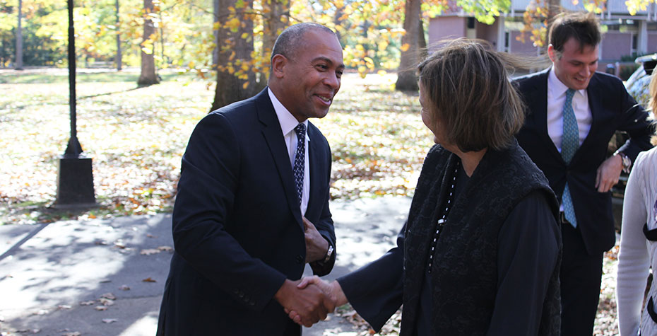 governor Patrick and president bottomly shake hands outdoors