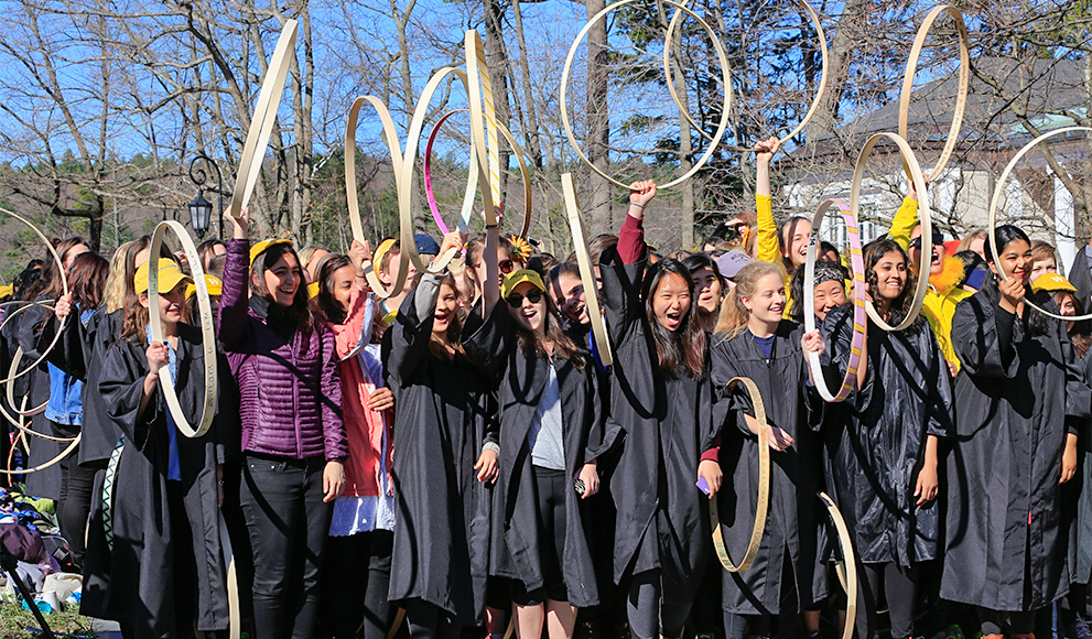 Wellesley seniors compete in the 120th Hooprolling competition.