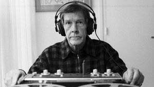 John Cage using reel-to-reel recorder
