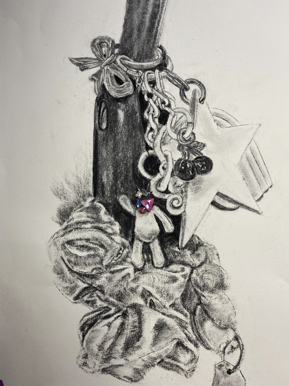 charcoal drawing of charms with colorful plastic real charms attached