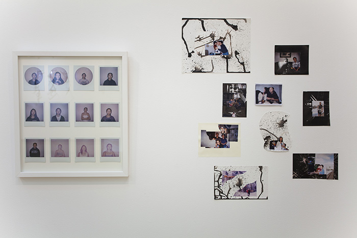 a white frame with 12 polaroid portraits in it, to the left of a salon-style grouping of altered photographs on a white wall