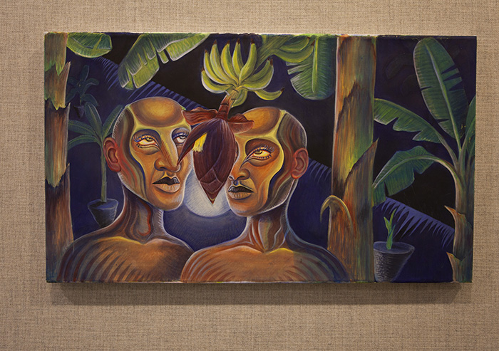 a horizontal painting of two bald heads with foliage behind them and a dark purple flower bud between them