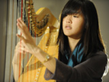 Girl playing the harp