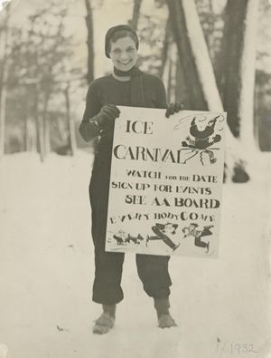 A student from the class of 1932 holds a sign that reads ice carnival