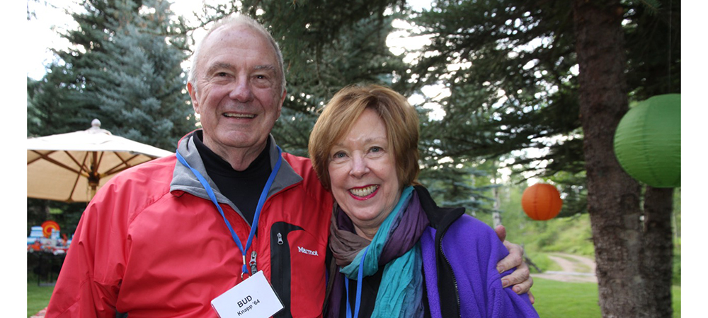 Betsy and Bud wearing jackets at an outdoor event