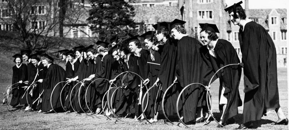 black and white image of students posing with their hoops