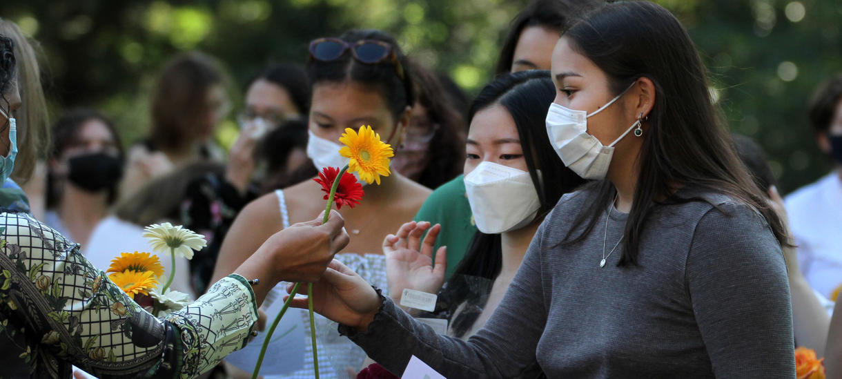Students gather flowers 