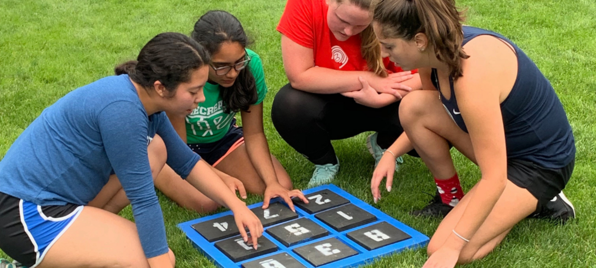 students solving a puzzle