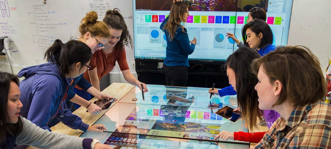 students work together on a tangible user interface  