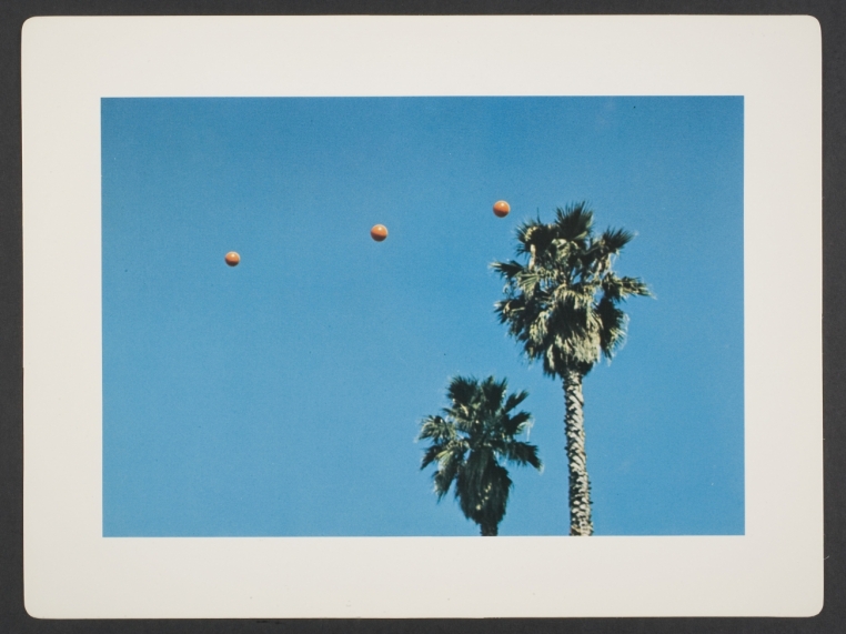 John Baldessari, Throwing Three Balls in the Air to Get a Straight Line (Best of Thirty-Six  Attempts), sheet from artist book consisting of folio cover and fourteen leaves, 1973. 9 5/8 in. x   12 3/4 in. (24.4 cm x 32.4 cm). Museum purchase, The Nancy Gray Sherrill, Class of 1954,   Acquisition Fund. 2007.161 © John Baldessari