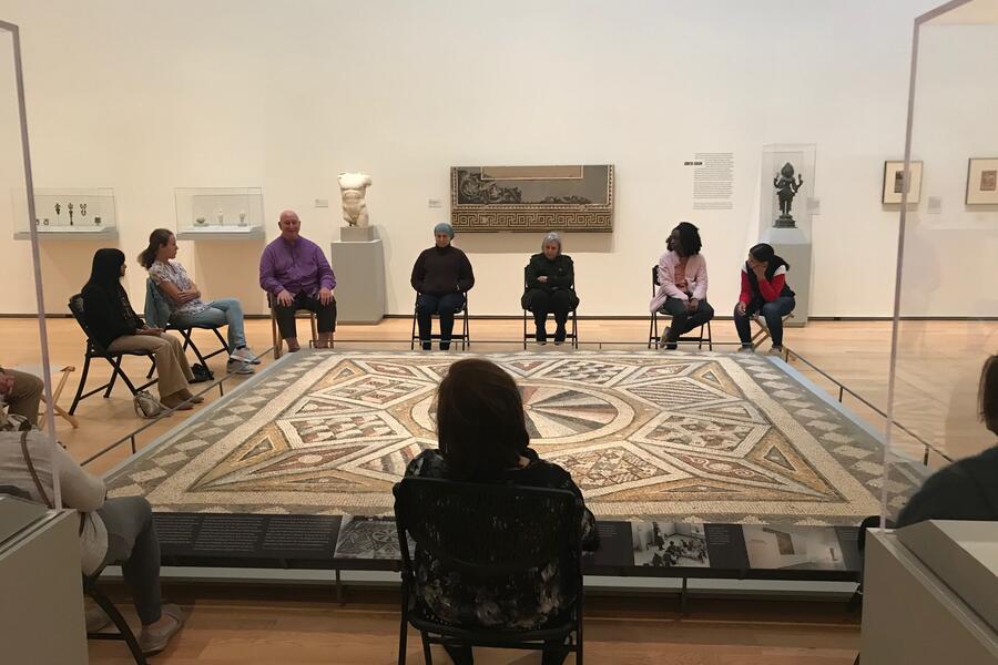 people meditating in the Davis museum
