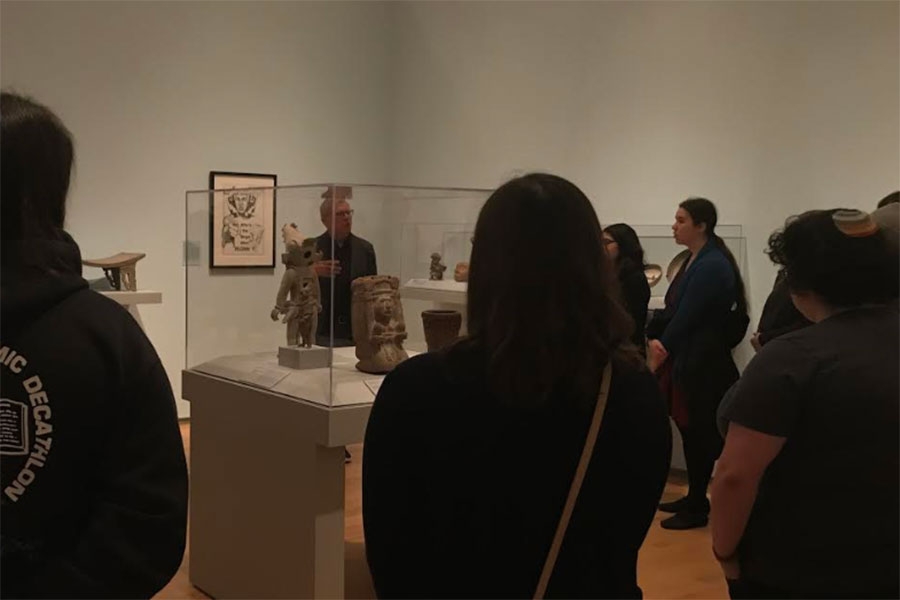 james oles speaking in a gallery