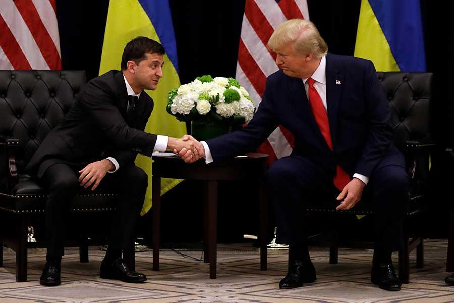 Ukrainian president Volodymyr Zelensky shakes hands with U.S. president Donald Trump