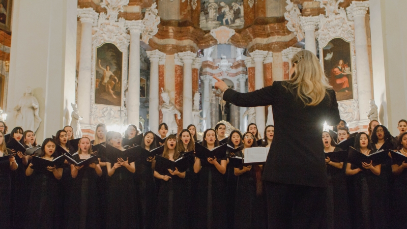 choir performing in front of director