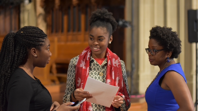 Attendees of the event participating in Interfaith Service