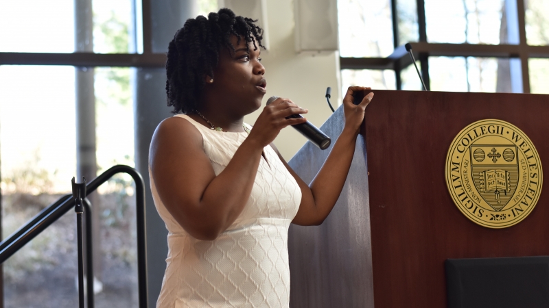 A speaker at the podium 