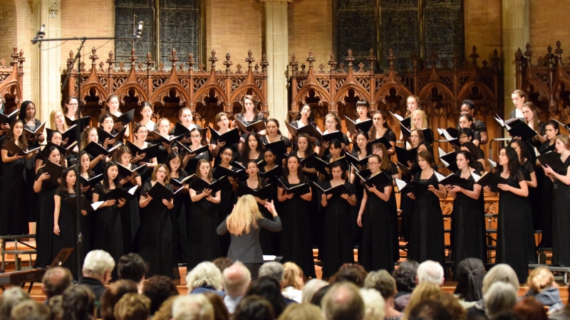 choir performing in Wellesley Houghton Chapel