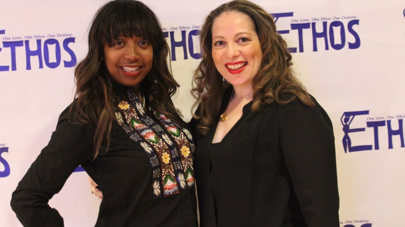 Two students standing in dresses for the Ethos gala