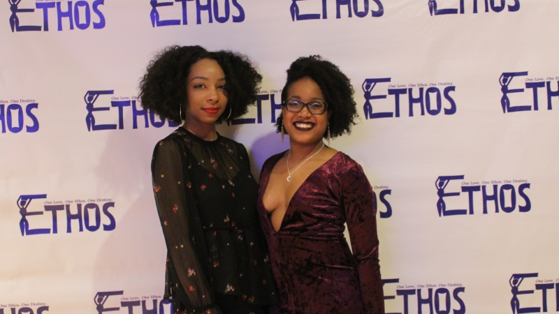 Two students standing in dresses for the Ethos gala