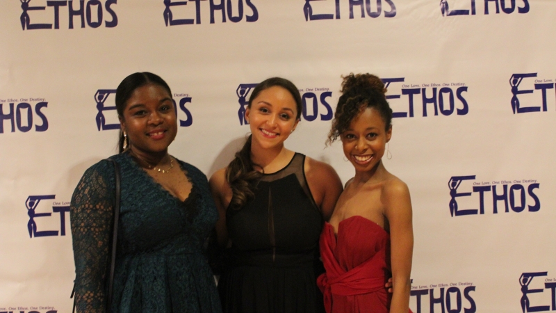 Three students standing in dresses for the Ethos gala