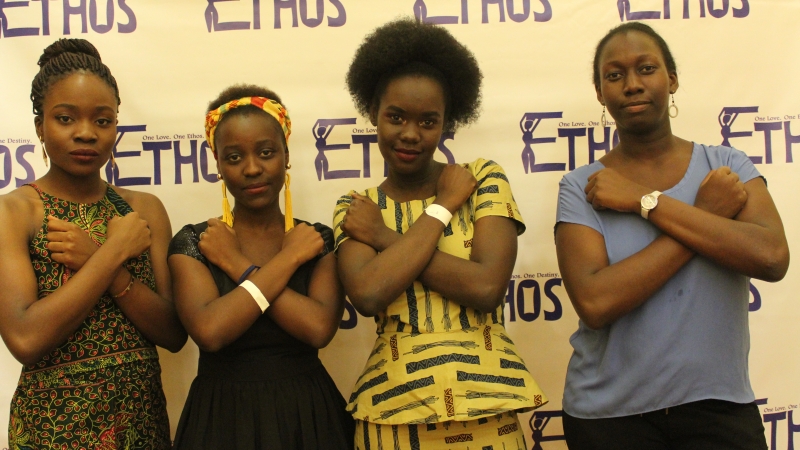 Students making the Wakanda pose