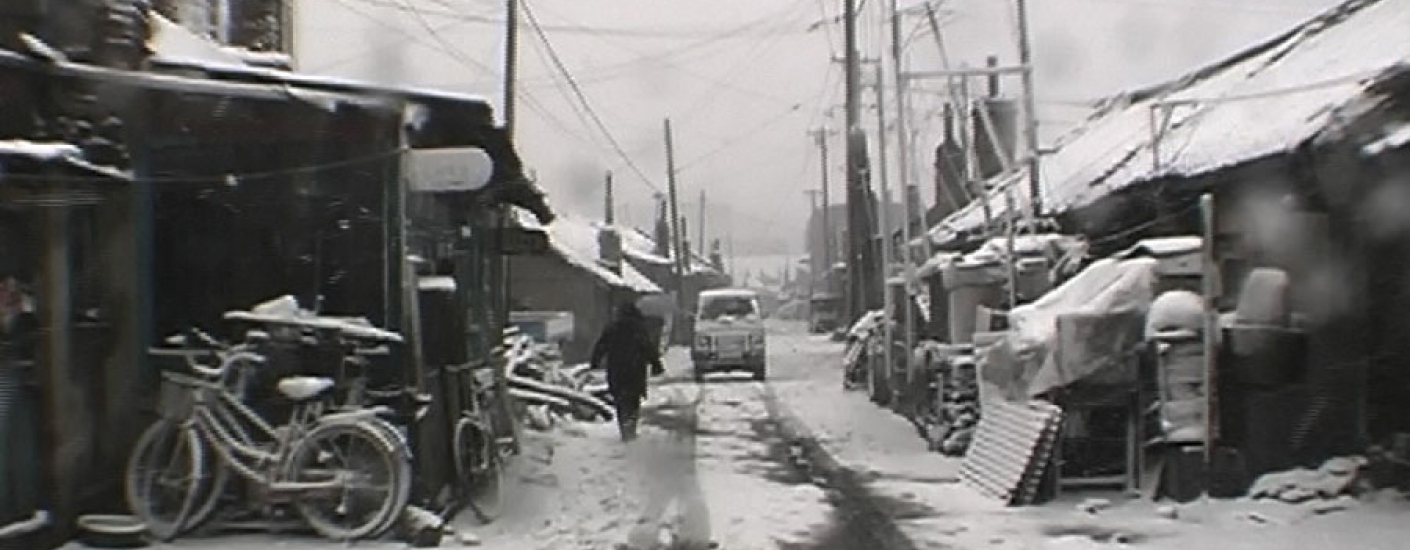 still from Wang Bing's film west of the tracks