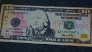 A $10 bill with the face of Education Reformer Elizabeth Peabody Superimposed