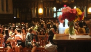 Flowers in the foreground, Houghton Chapel filled for Flower Sunday
