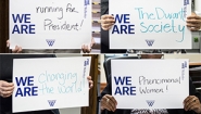 Signs reading "We are..." completed by ideas defining Wellesley