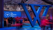 An interior photo of the Wellesley fieldhouse decorated for the launch of the Campaign for Wellesley