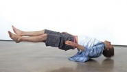 Tony Matelli's lifelike sculpture of a supine man appears to float a foot above ground