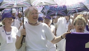 silver-haired purple class alums march in parade