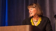 Lisa Lynch at podium during Heller School 55th anniversary