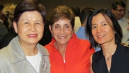 Lois Juliber ’71 (center) with MasterCard Foundation CFO Peggy Woo (left) and Reeta Roy, president and CEO (right).