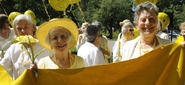 Wellesley Celebrates Reunion 2016 Wellesley alumnae hold a yellow class banner.