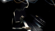 silhouette of piano player