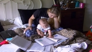 scene from show with teen doing homework with baby